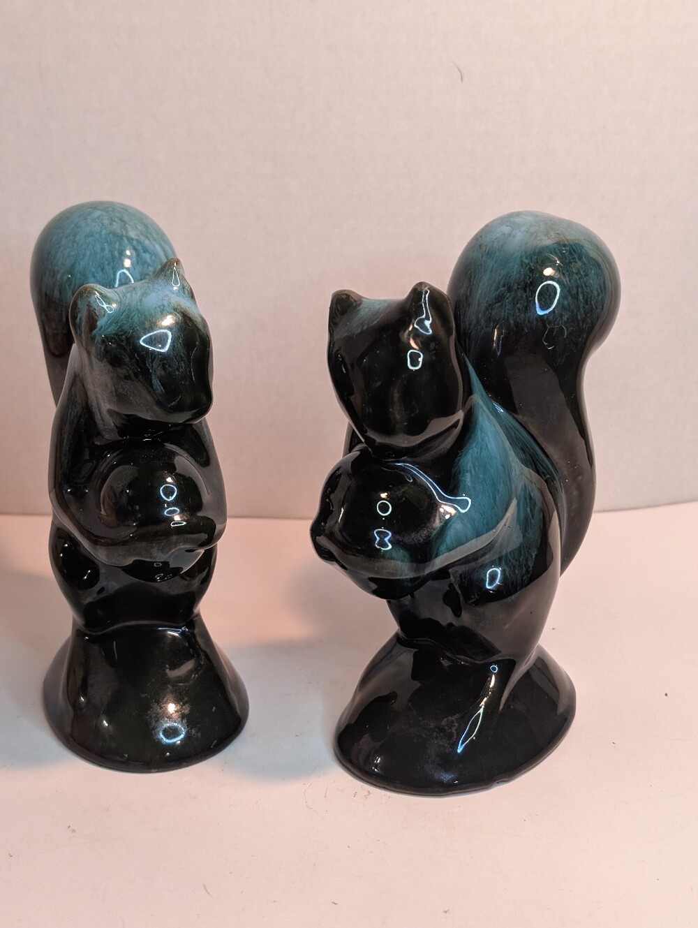 Two Blue Mountain Pottery squirrel figurines In A Blueish Green and Black